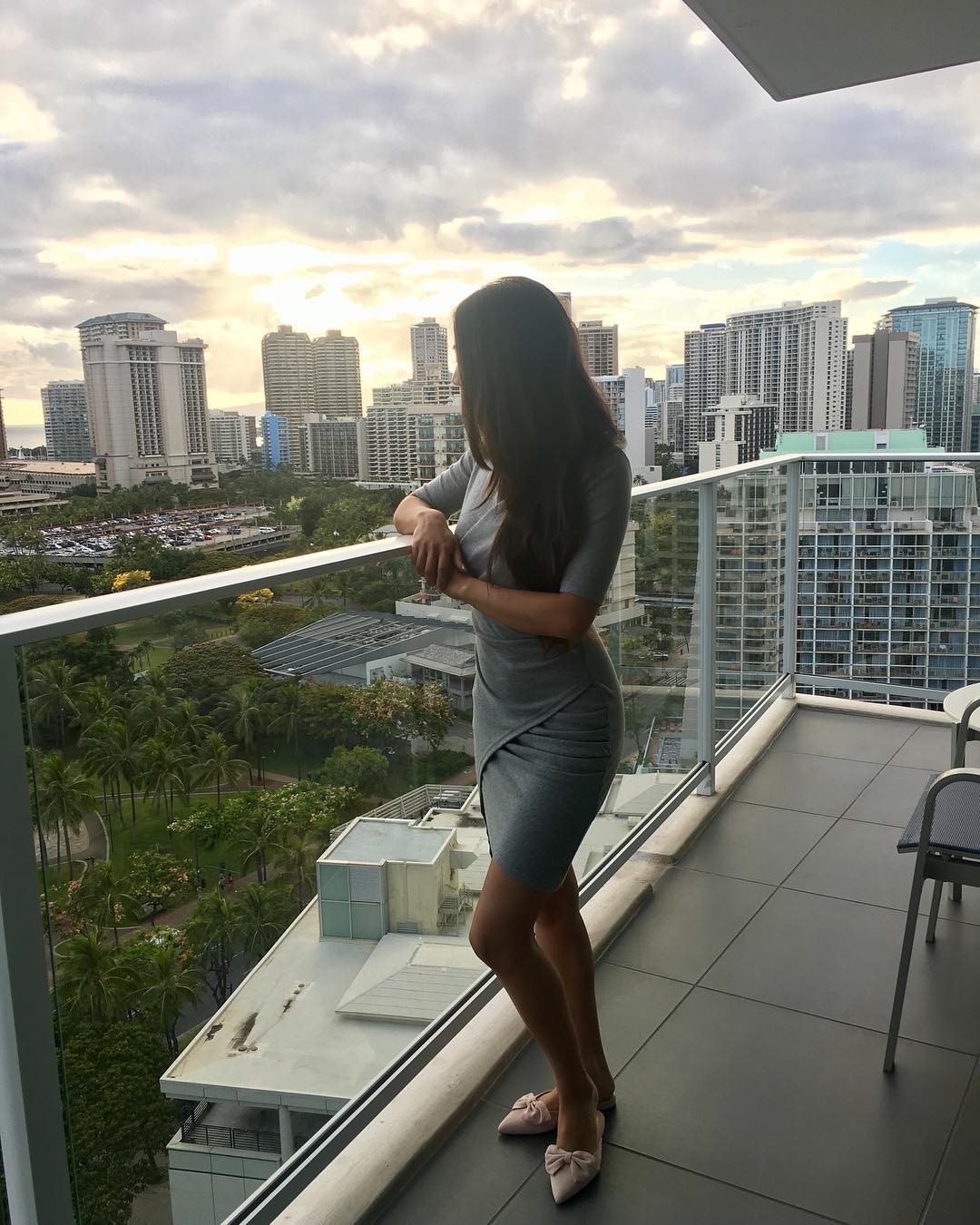 Vanessa Rallonza: Elegant Balcony Vista over Enchanting Cityscape