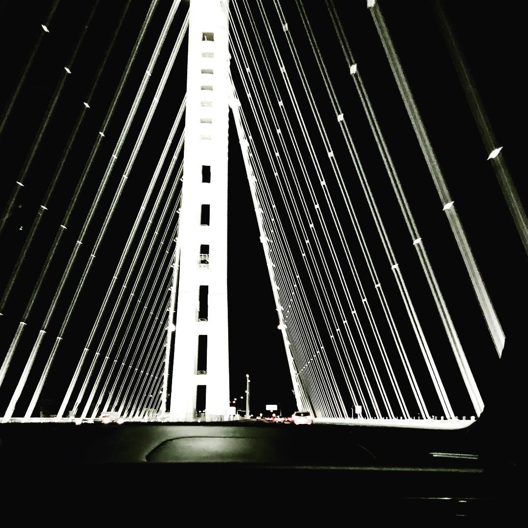 Vanessa Rallonza's Timeless Bay Love: Iconic Black-and-White Bridge