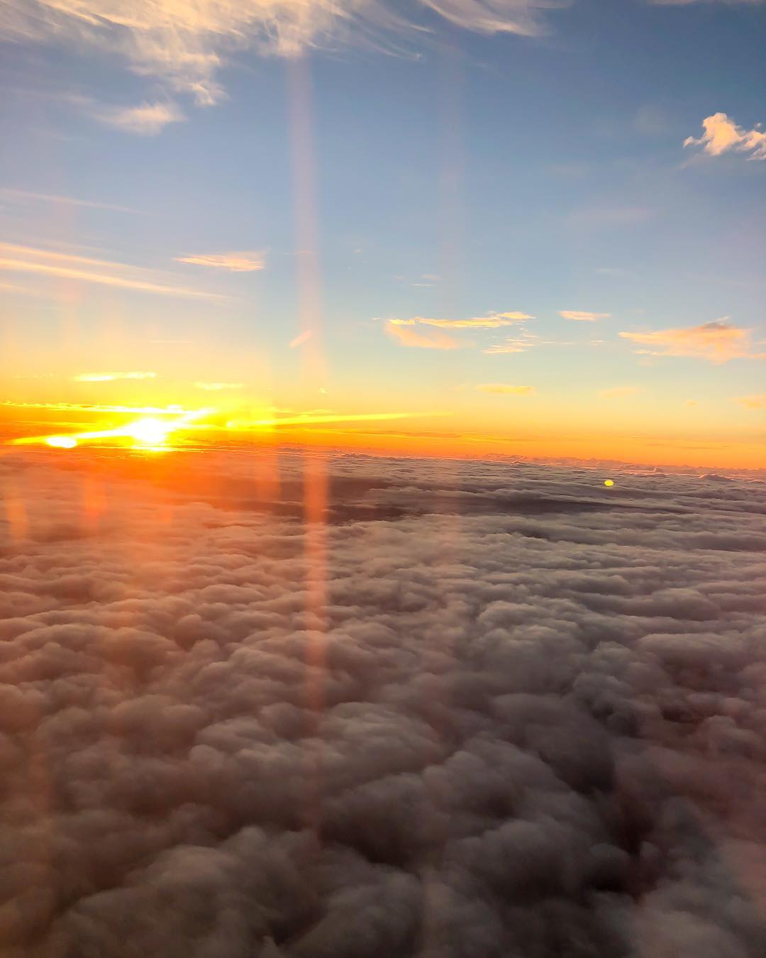 Vanessa Rallonza: Sunset Silhouette over Cloudy Glow
