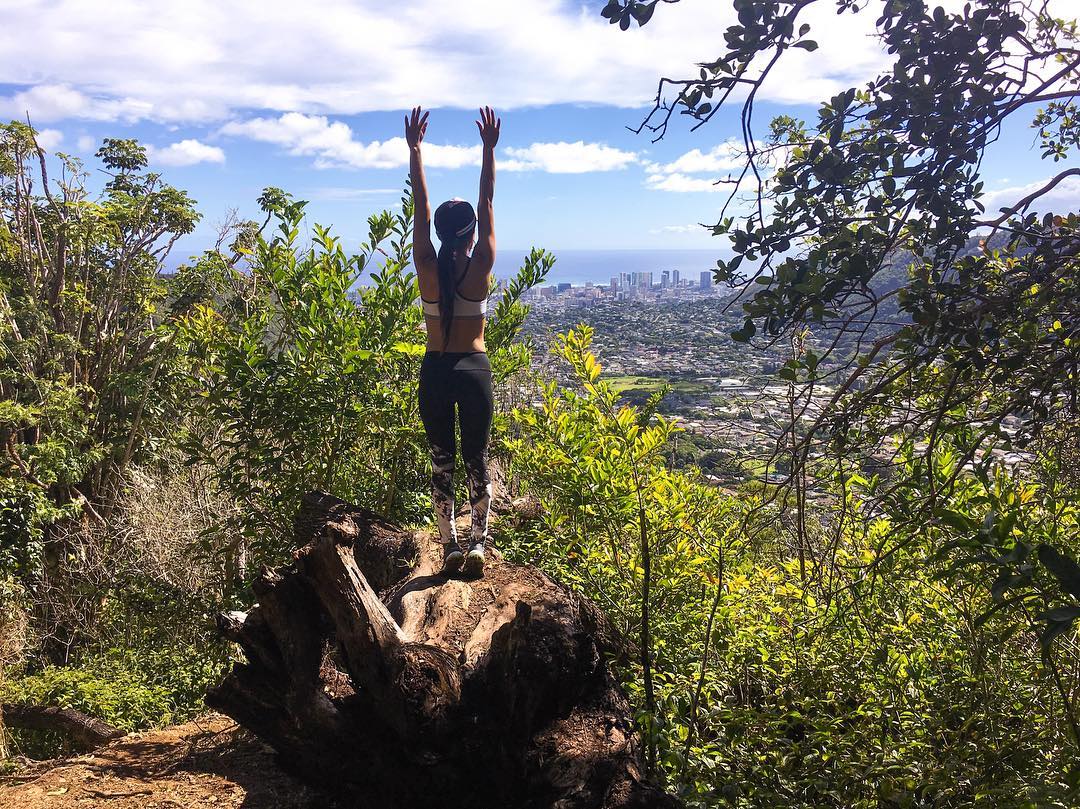Vanessa Rallonza: Grace Amidst Open Clouds atop Tree Stump