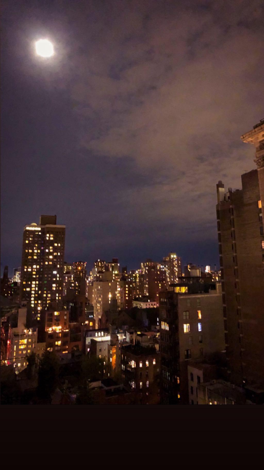Vanessa Rallonza: Full Moon Illuminates Urban Skyline