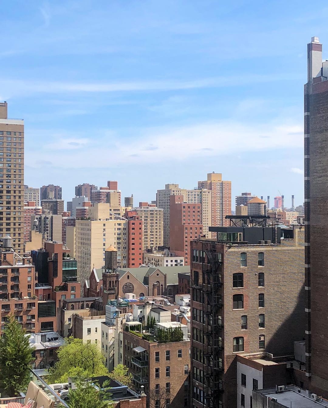 Vanessa Rallonza: Defying Rainy Forecasts - High-Rise Cityscape View