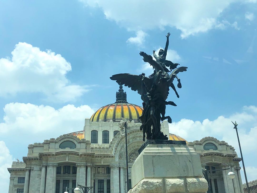 Vanessa Rallonza's Pick: Majestic Man-atop-Rearing-Horse before Historic Building