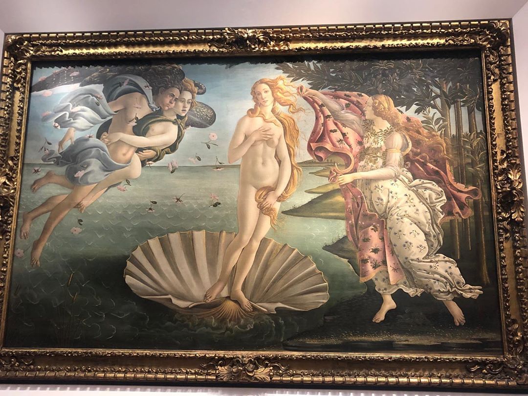 Vanessa Rallonza's Captivating Landscape: Woman and Two Men Gracefully Posed