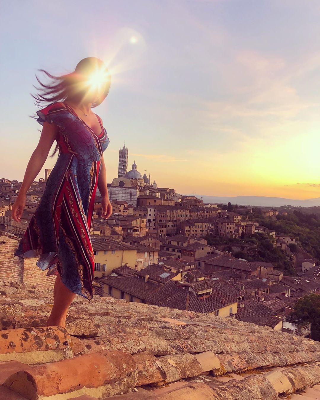 Vanessa Rallonza at Sunset-Kissed Toledo Skyline, Rocky Outcrop Stroll