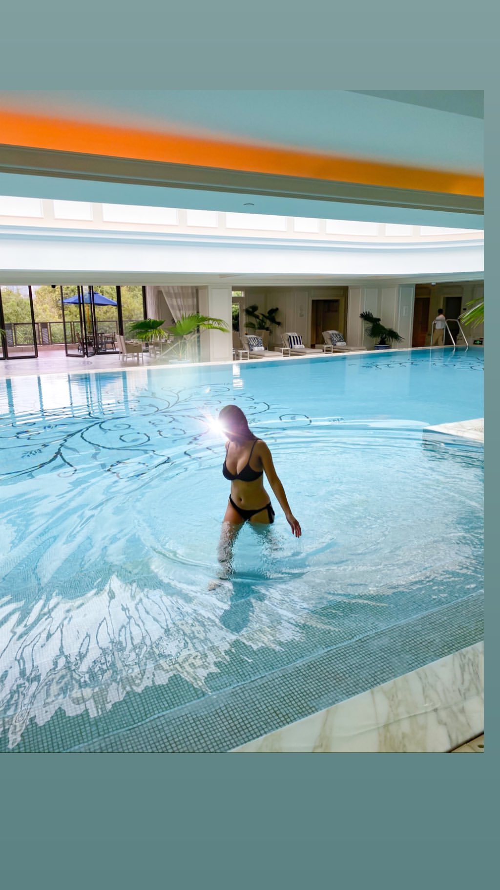 Vanessa Rallonza: Man Mid-Dive Framed by Blue Swimming Pool - Captivating Composition
