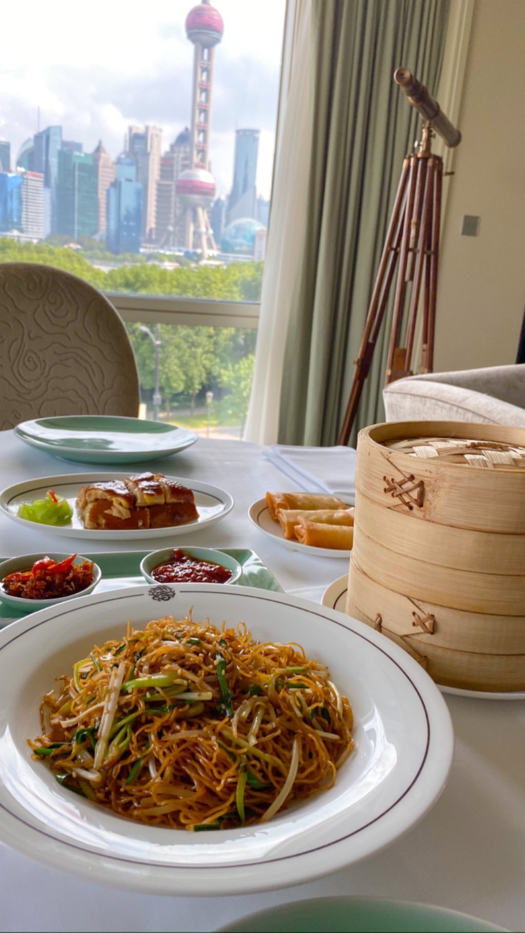 Vanessa Rallonza's Inviting Dining Setup with Scrumptious Cuisine and Steaming Noodles