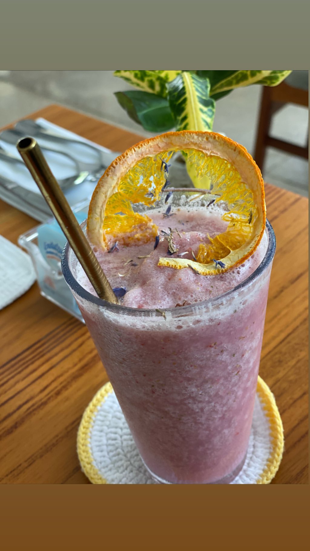 Vanessa Rallonza Enjoying a Festive Pink Cocktail