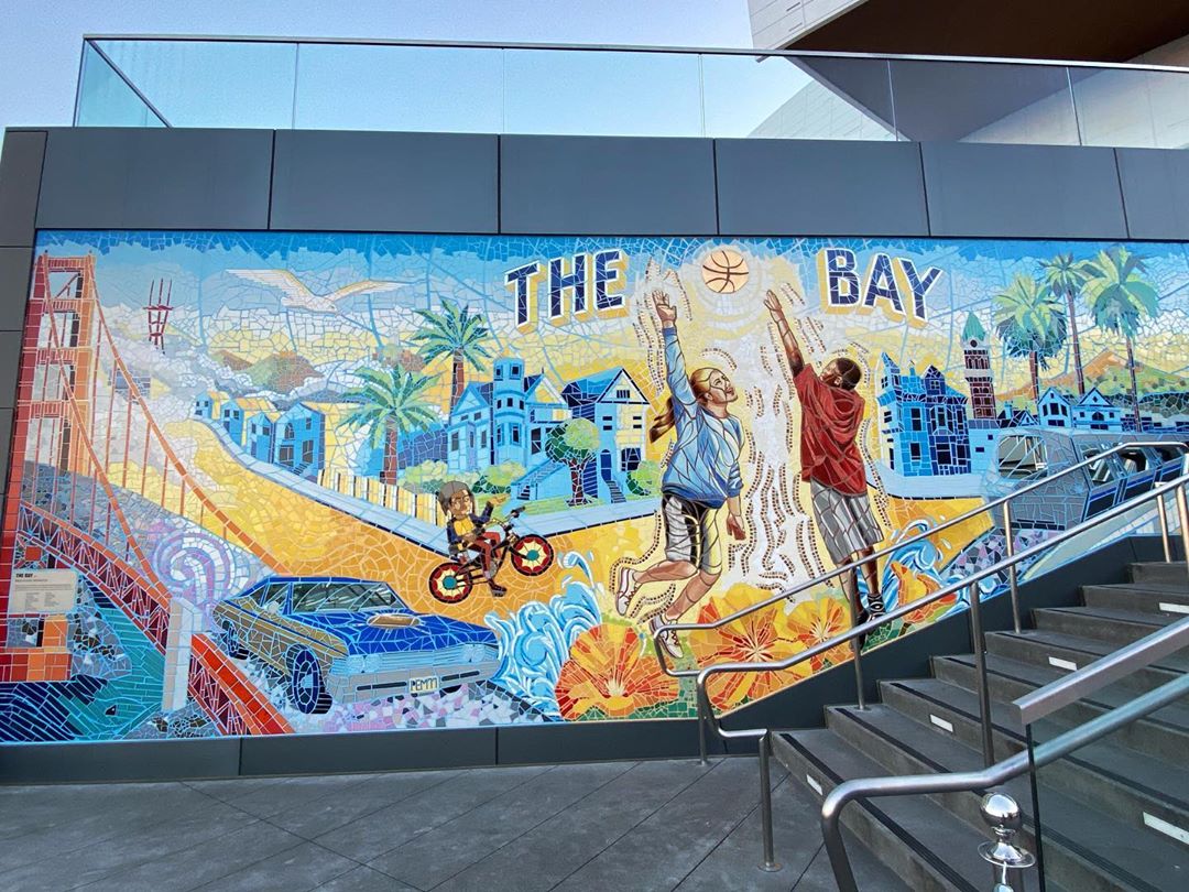 Vanessa Rallonza's Historic Building Mural: Urban Charm Meets Vibrant Artistry