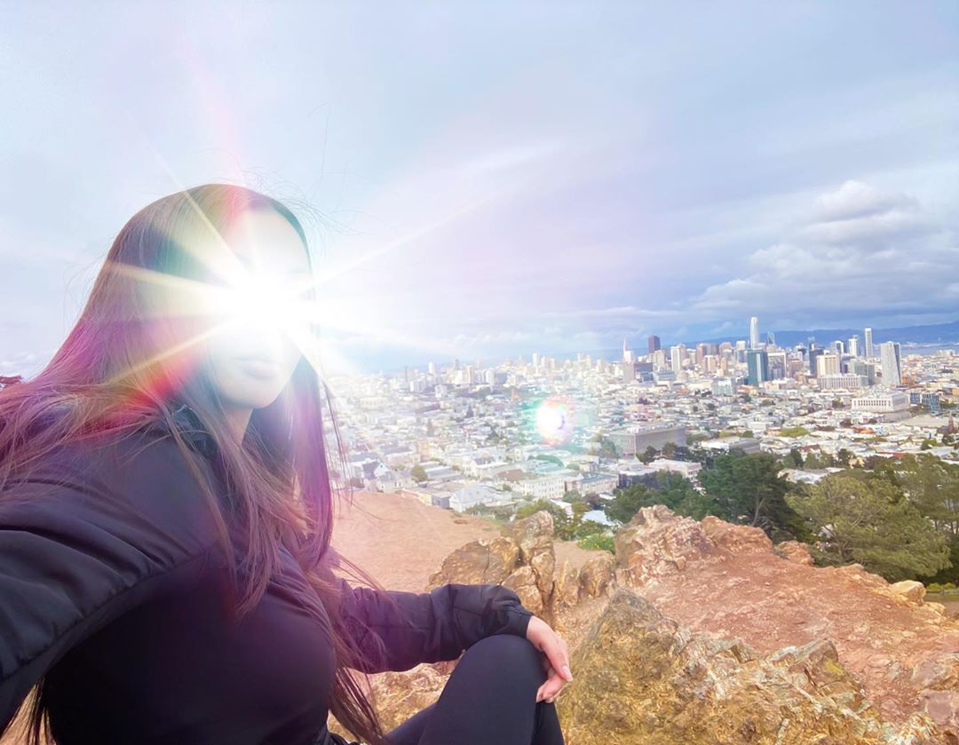 Vanessa Rallonza: Serene Summit Gazing Urban View