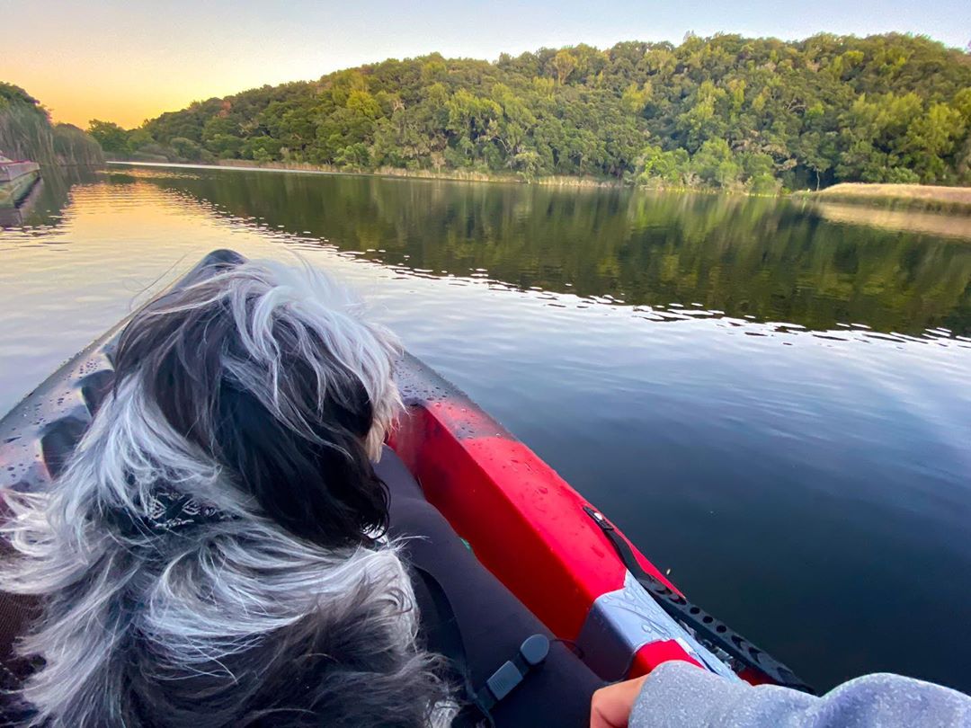 Vanessa Rallonza Preparing for Fishing Adventure, Grinning Kayak Enthusiast