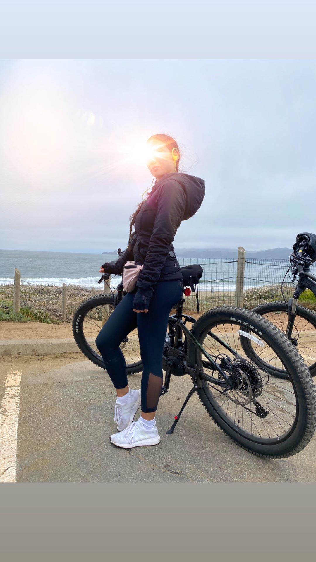 Vanessa Rallonza: Graceful Bicycle Overlooks Ocean Panorama