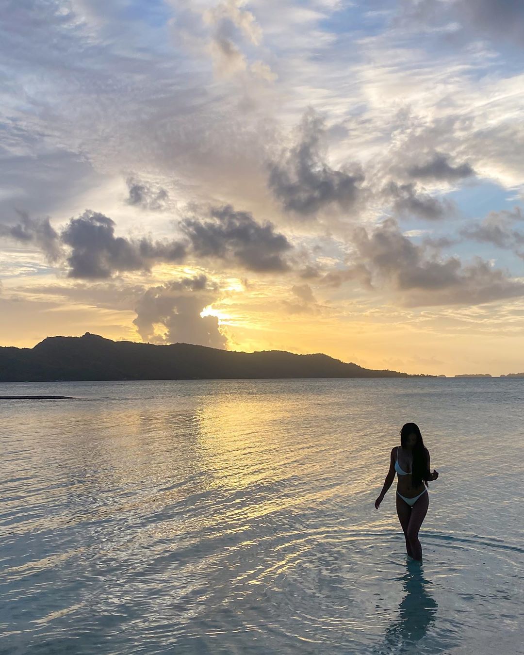 Vanessa Rallonza: Graceful Sunset Embrace in Ocean Depths