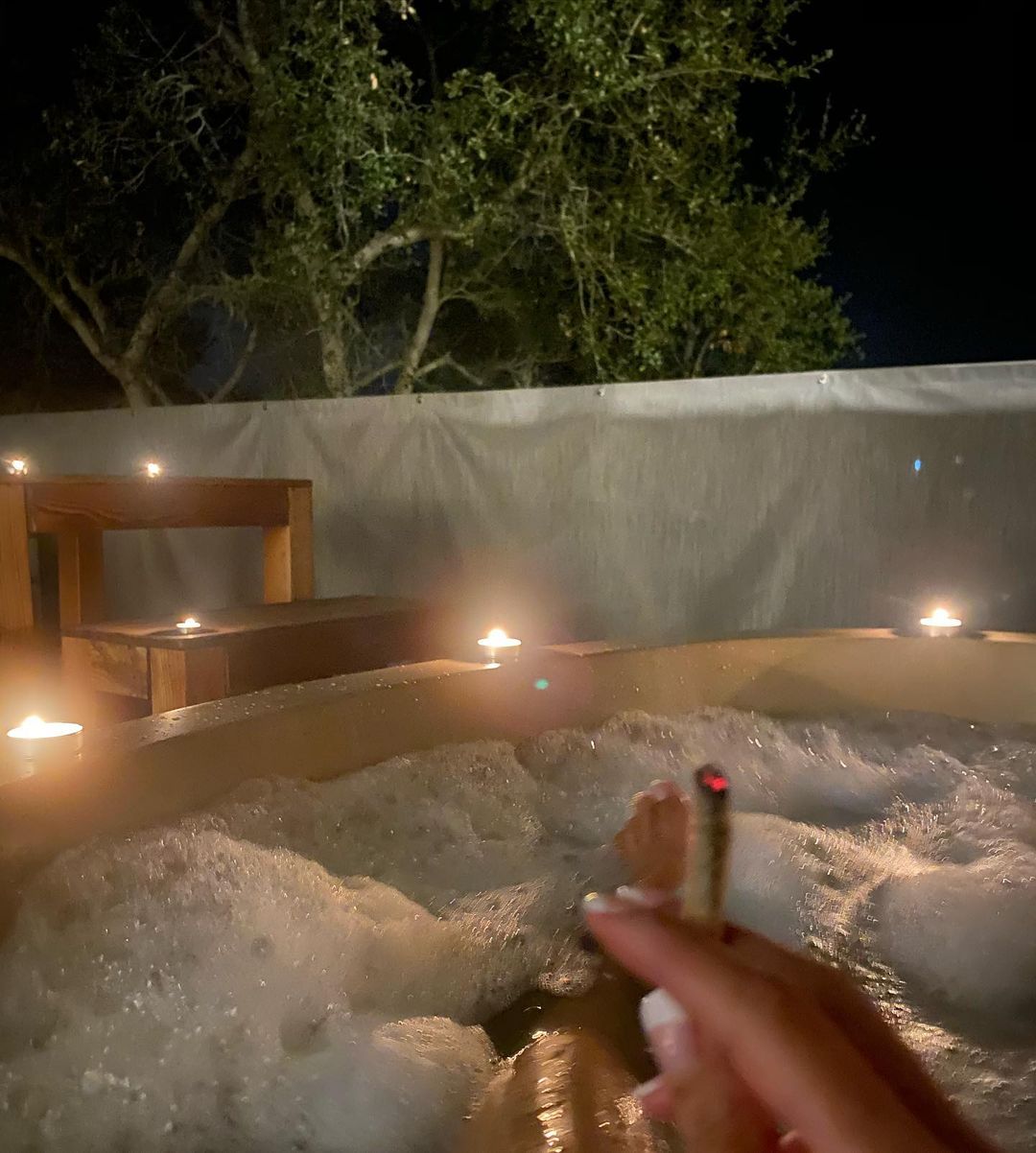 Vanessa Rallonza: Woman's Tranquil Hot Tub Relaxation