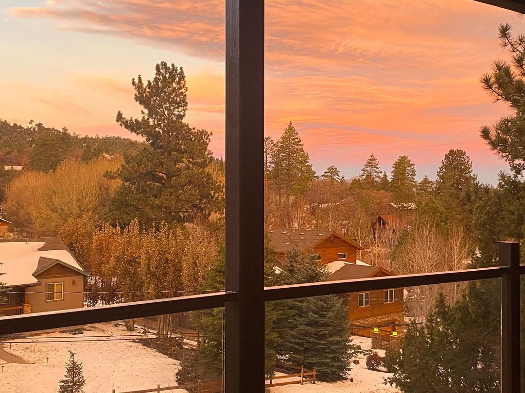 Vanessa Rallonza: Quaint Window Framing Majestic Mountains