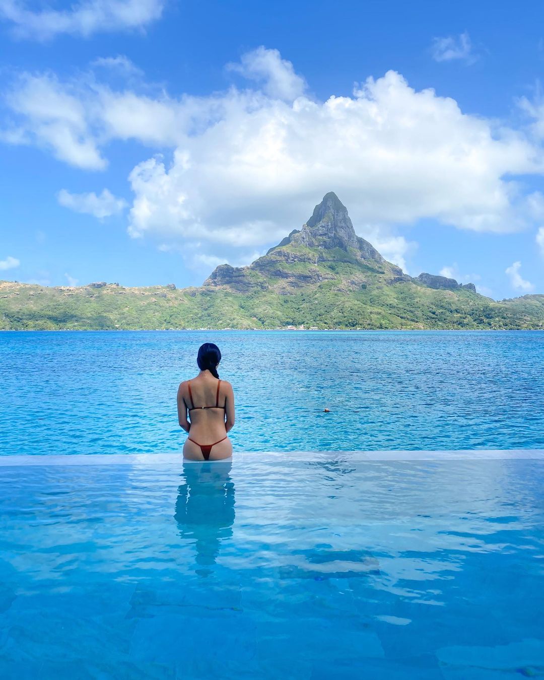 Vanessa Rallonza: Contemplative Serenity Over Ocean View
