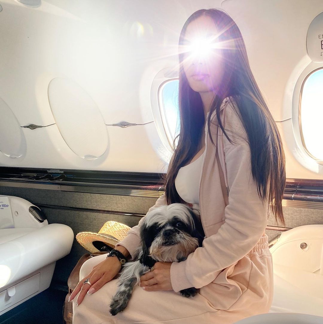 Vanessa Rallonza: Traveling Duo, Pink-Clad Mother & Canine Friend